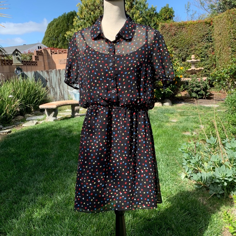 Dress by:   Risqué Fashion LA